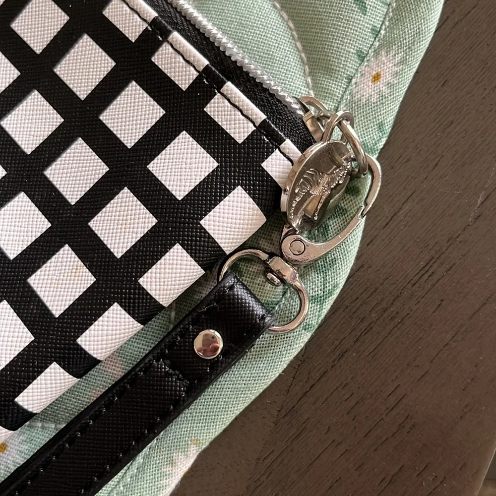 Dabney Lee black/white cosmetic bag/wristlet.